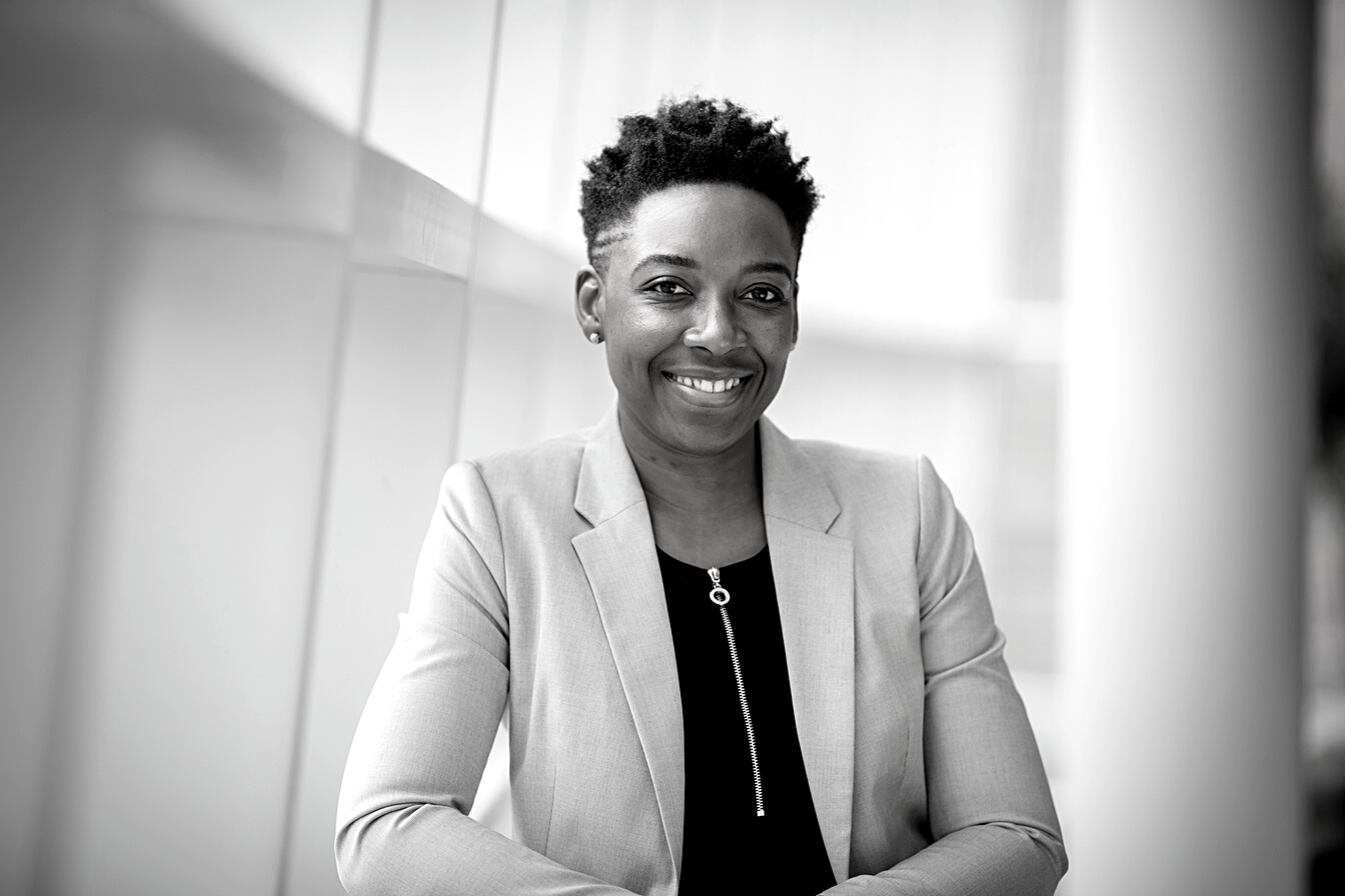 Woman Wearing Gray Notch Lapel Suit Jacket